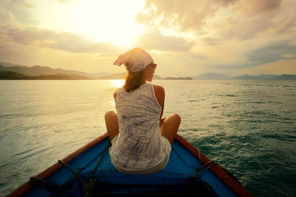 Woman in kyack on lake