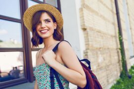 Young Woman In Straw Hat